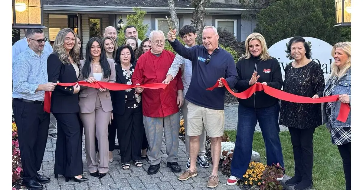 The Olive & Oak ribbon-cutting ceremony with Jefferson Township Mayor Eric Wilsusen and members of the community